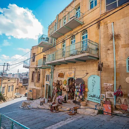 Historic yellow stone buildings and streets of As Salt Jordan