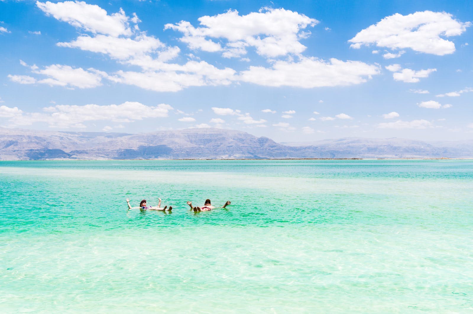 Floating experience in the mineral rich waters of the Dead Sea Jordan