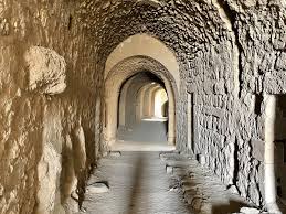 Stone corridors and defensive walls at Karak Castle Jordan
