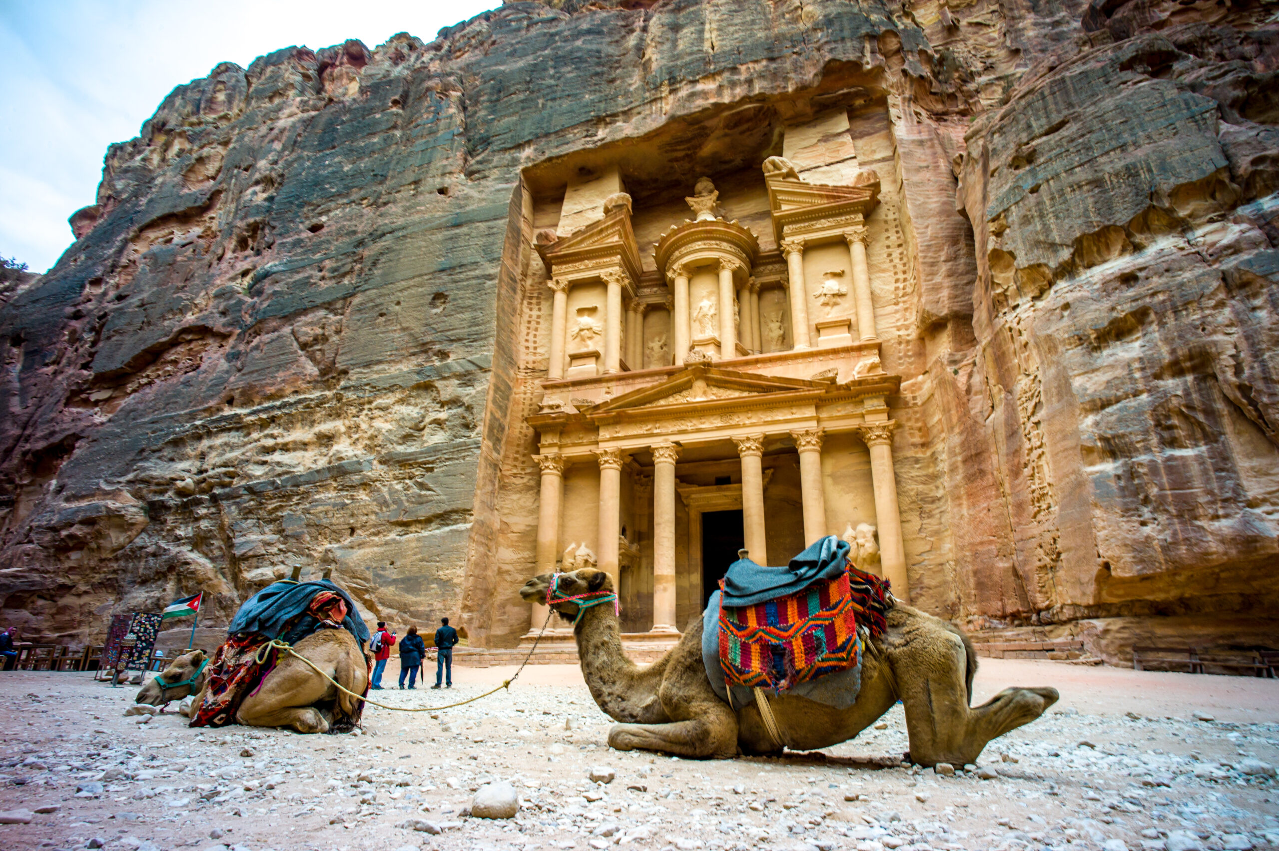 Visitors exploring the ancient Nabataean city of Petra Jordan