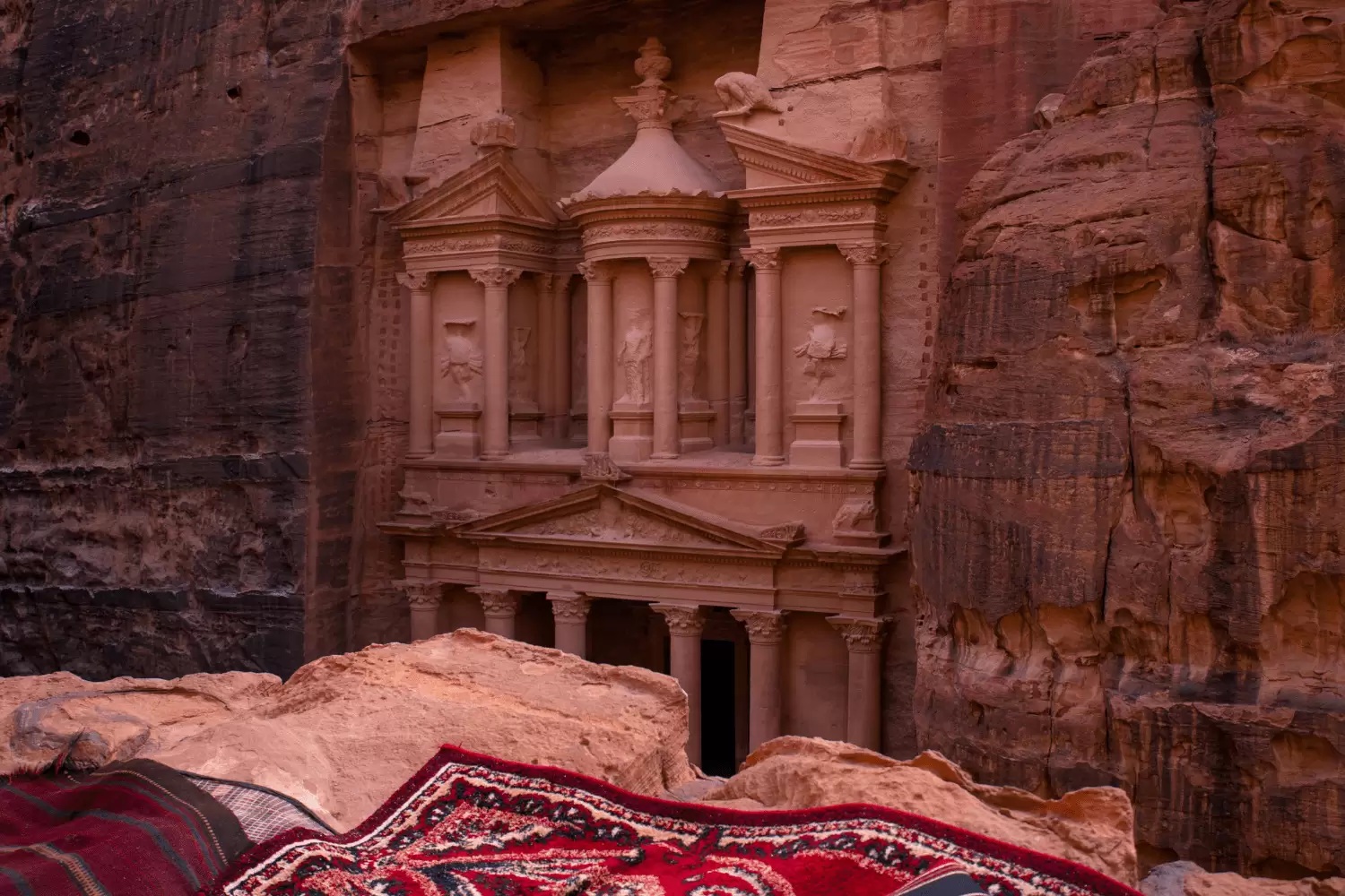 Visitors exploring the ancient Nabataean city of Petra Jordan