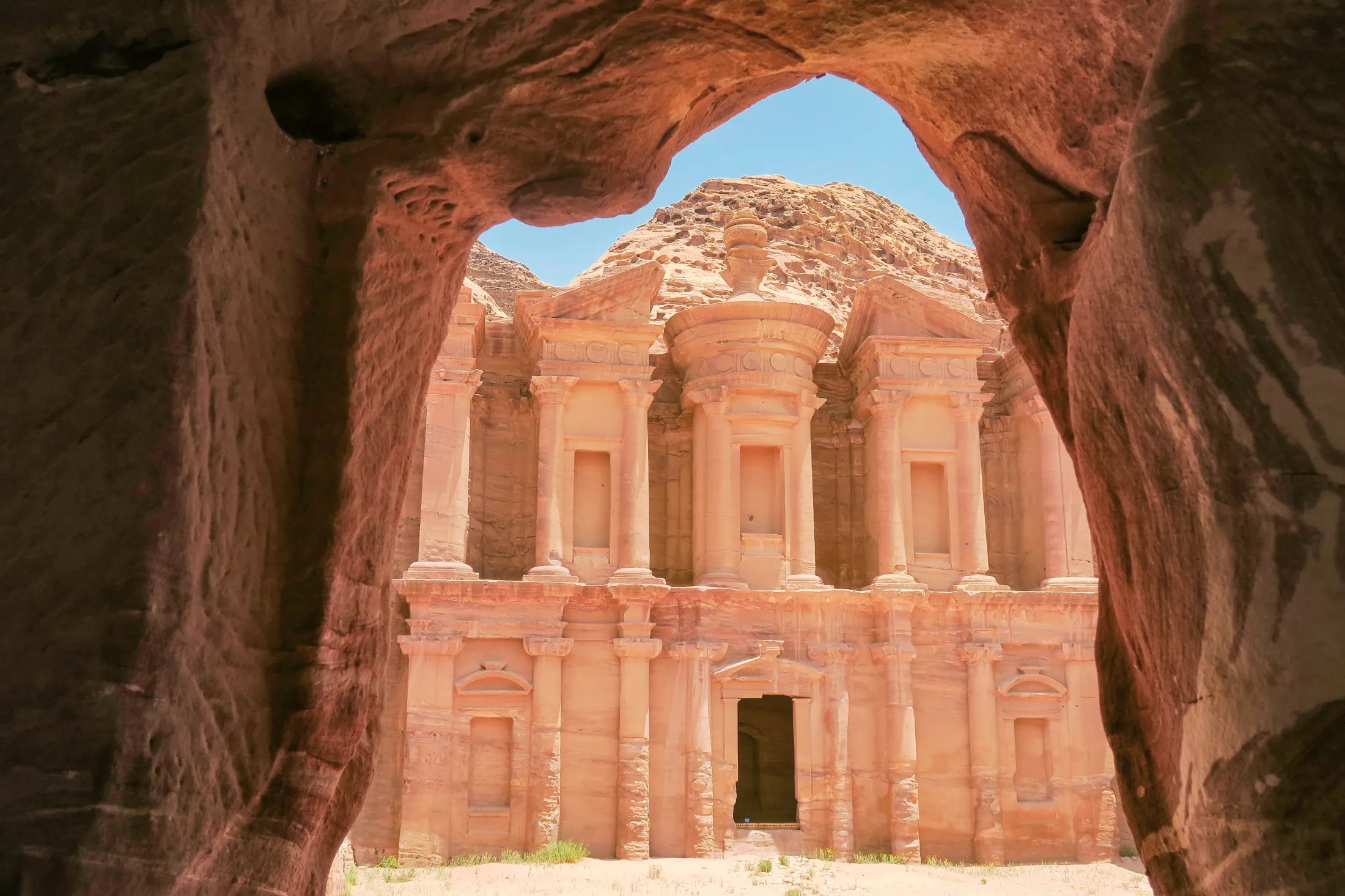 Visitors exploring the ancient Nabataean city of Petra Jordan