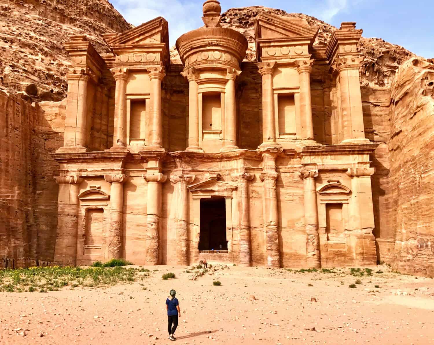 Historic rock cut tombs and mountain scenery in Petra Jordan