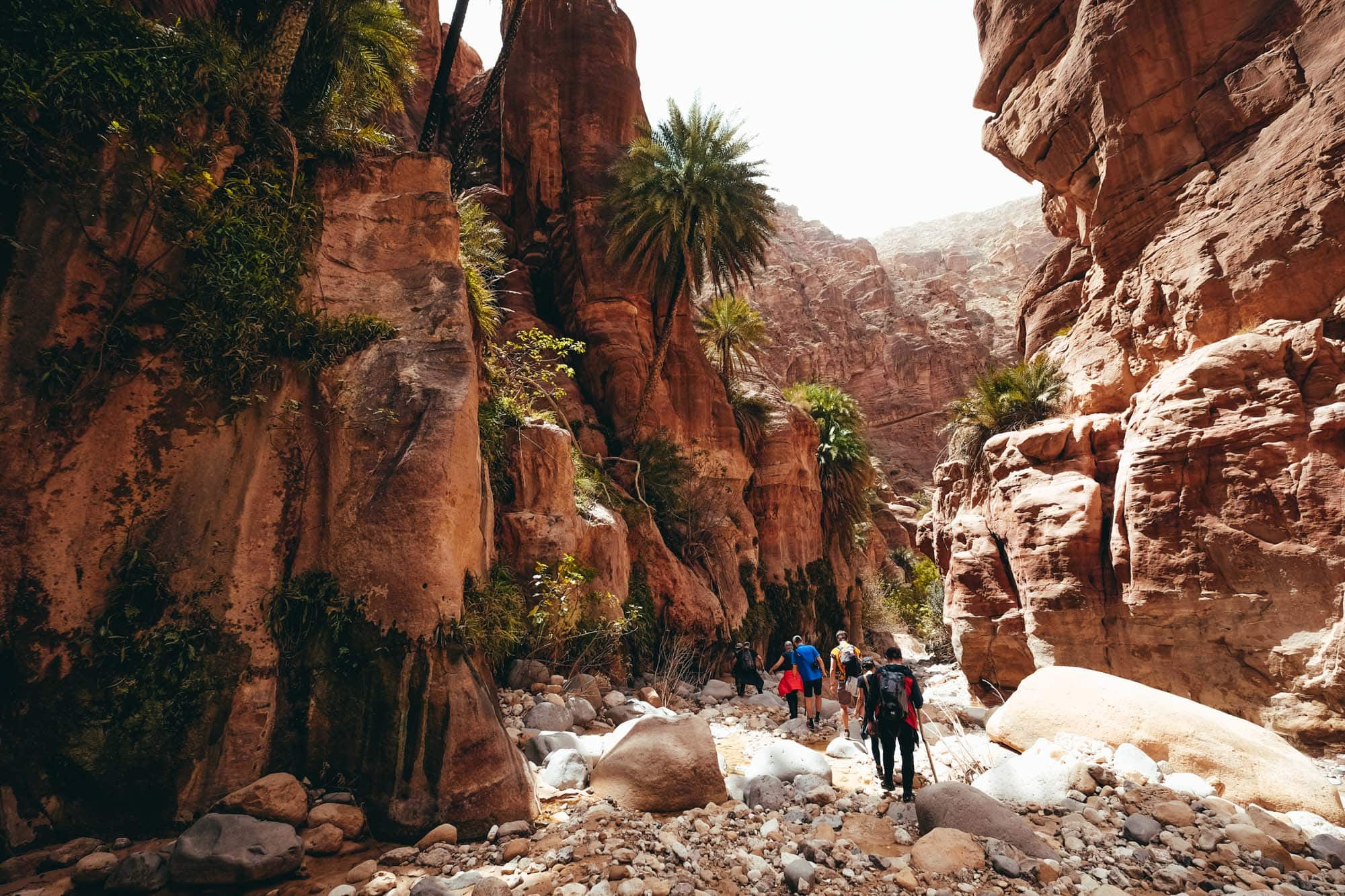 Jordan hiking tour through Wadi Al Ghuwair natural canyon