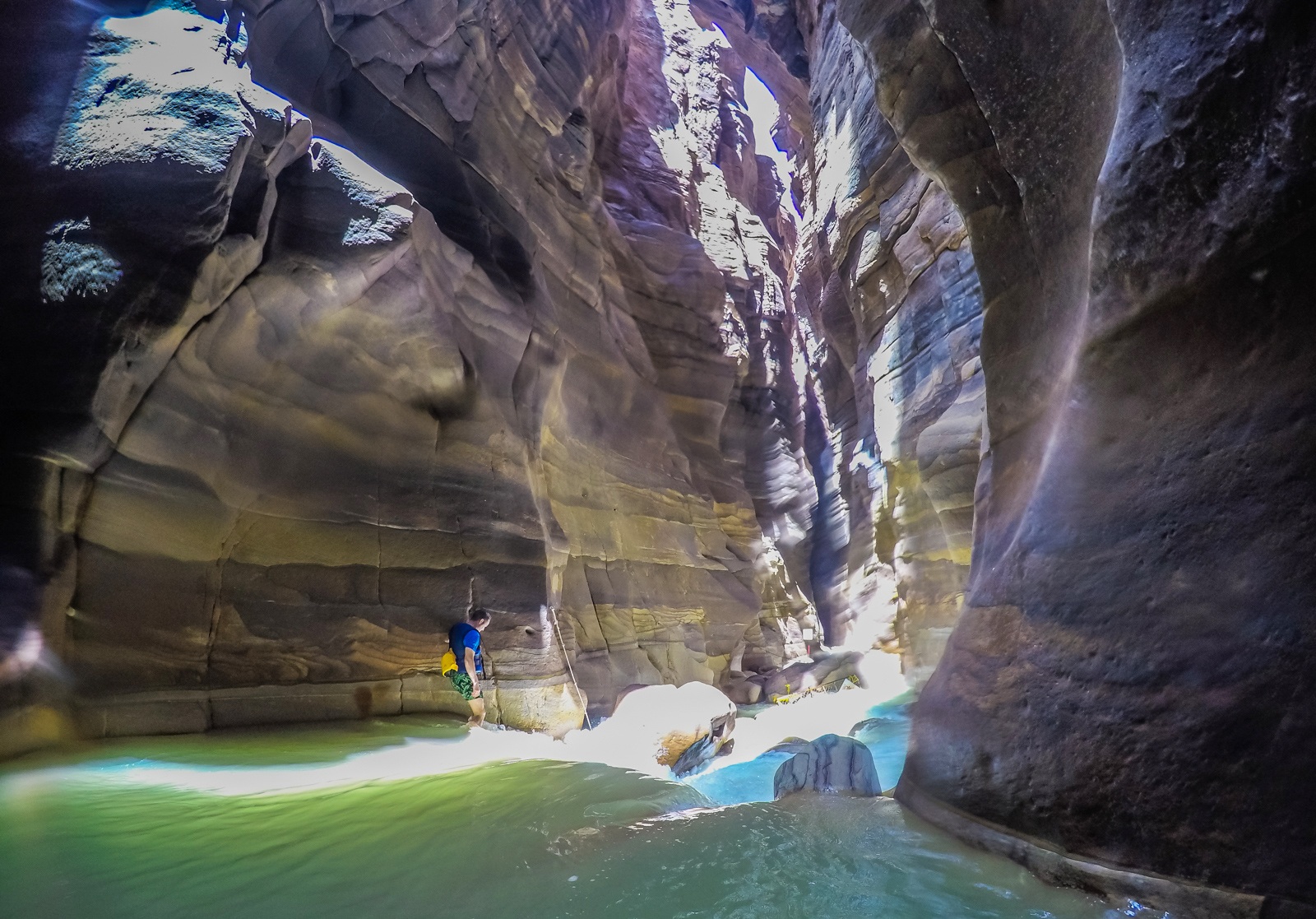 Dramatic sandstone canyon and water route in Wadi Mujib