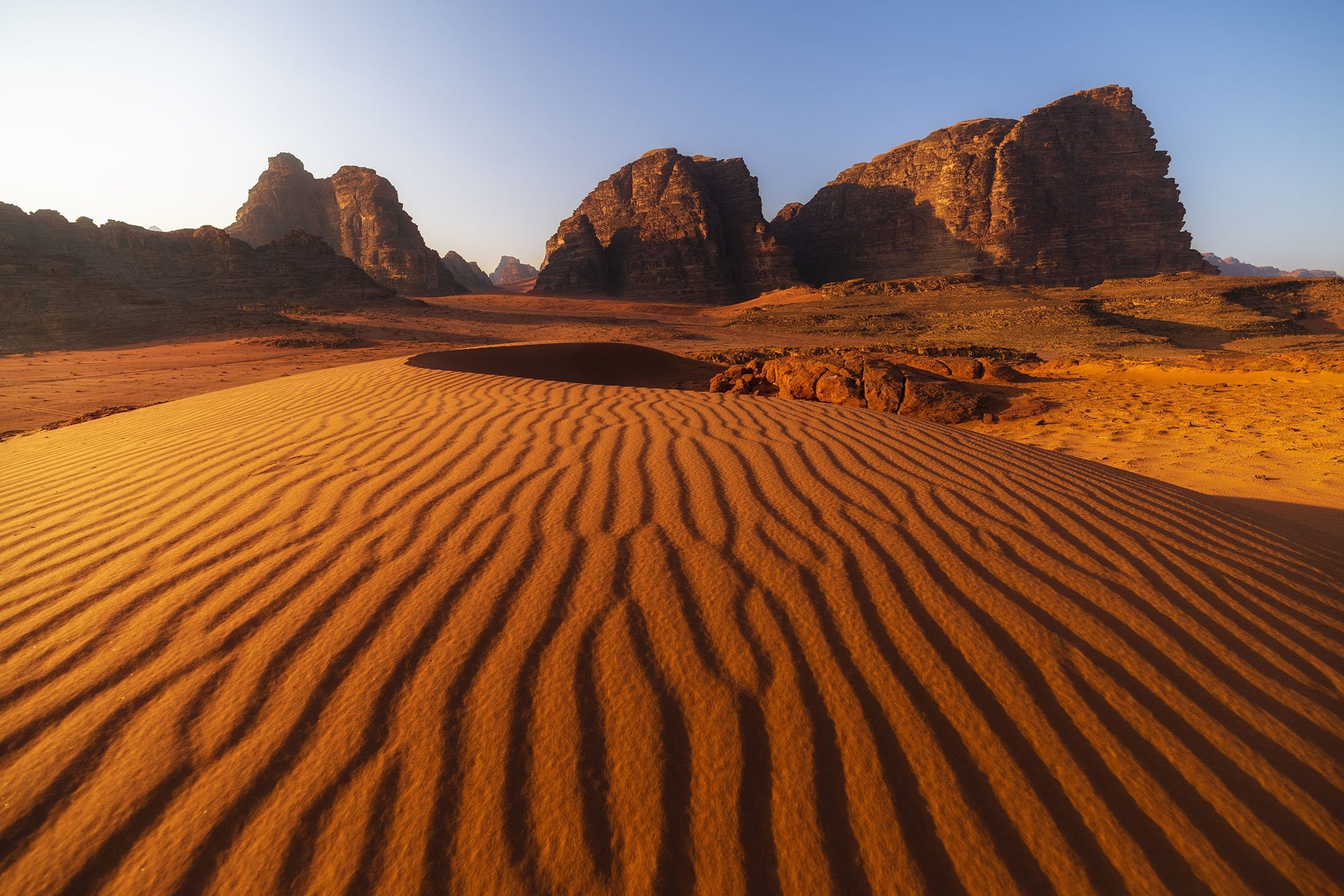 Red desert landscape and sandstone mountains in Wadi Rum Jordan