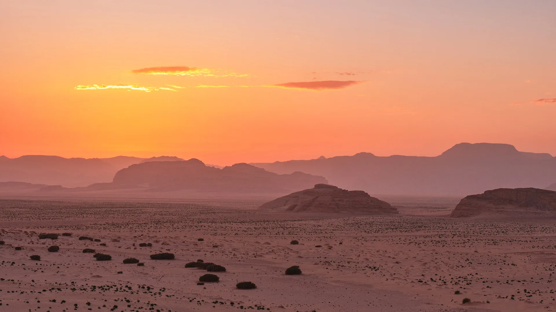 Bedouin desert camp surrounded by rock formations in Wadi Rum