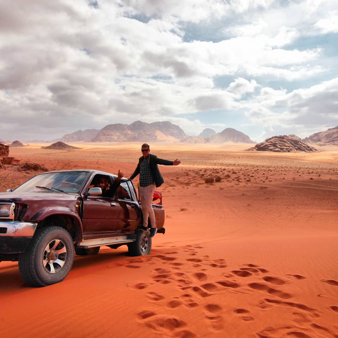 Bedouin desert camp surrounded by rock formations in Wadi Rum