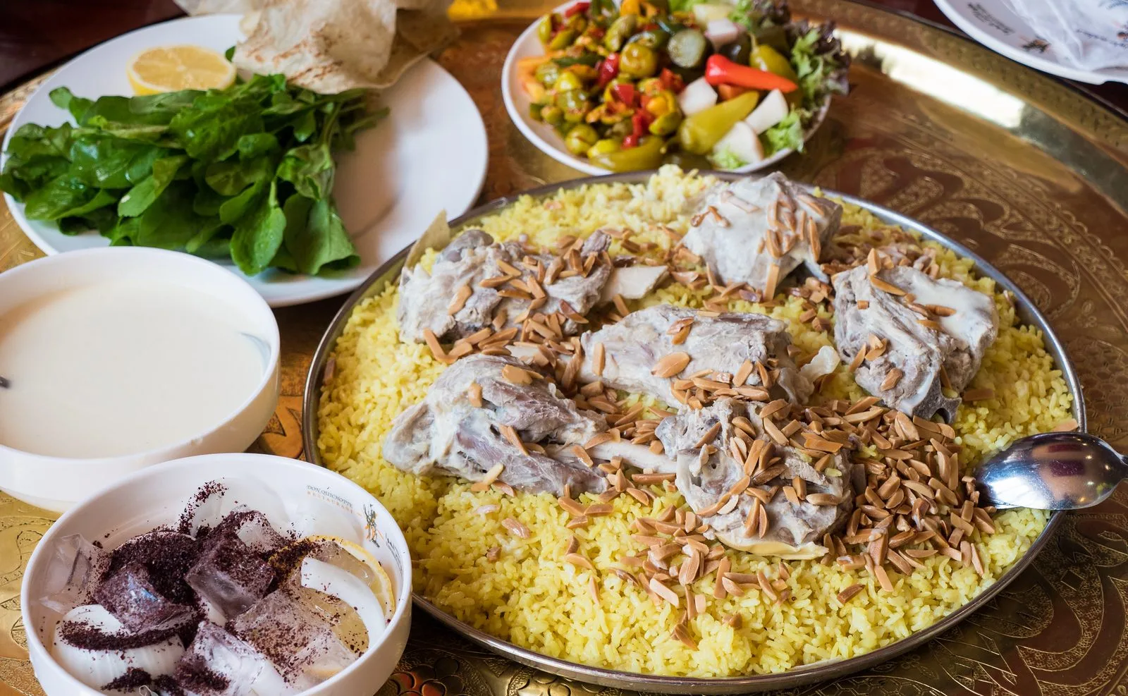 Traditional Jordanian mansaf experience during a private tour of Jordan with Jordan Horizons Tours