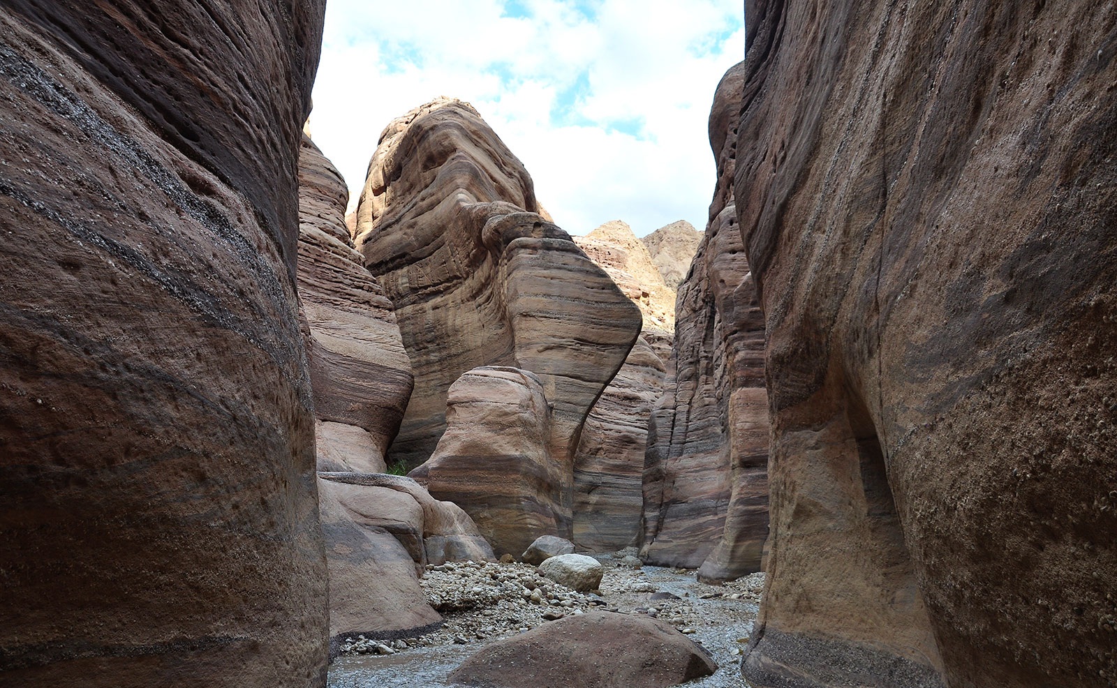 Wadi Numeira Jordan narrow sandstone canyon and water hiking trail near the Dead Sea
